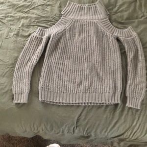 Large gray knit sweater with cold shoulder cut outs